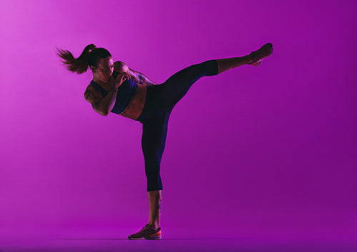 Woman athlete practicing martial arts
