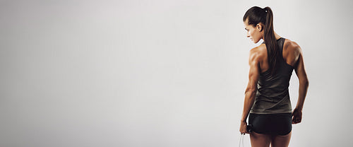 Fitness woman with skipping rope
