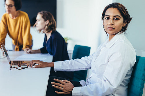Female executive in conference room