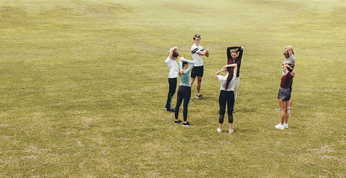 Teacher with her students at physical education class