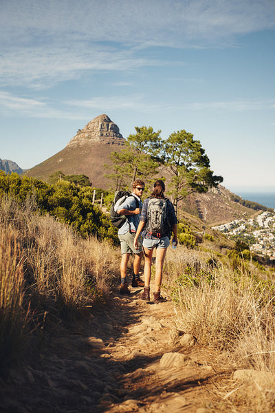 Hikers enjoying summer vacation in countryside