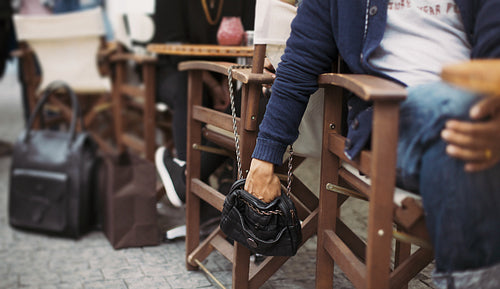 Pickpocketing at the street cafe