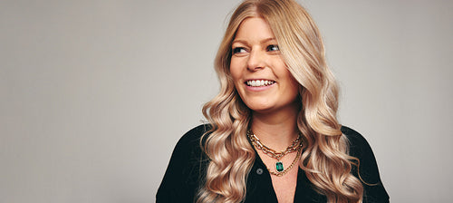 Happy woman looking away with a smile