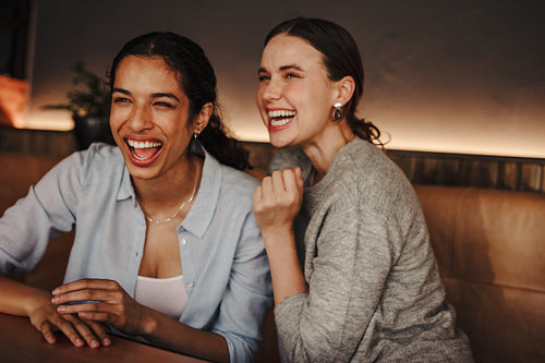 Friends having a great time in a coffee shop