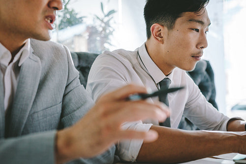Two business associates working at a restaurant
