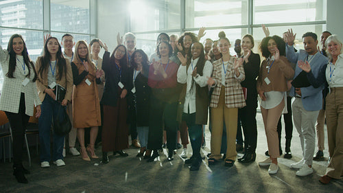 Business group applauding at event