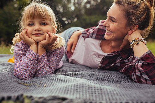 Mother and daughter relaxing in the park