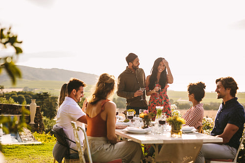 Couple at a party announcing their marriage