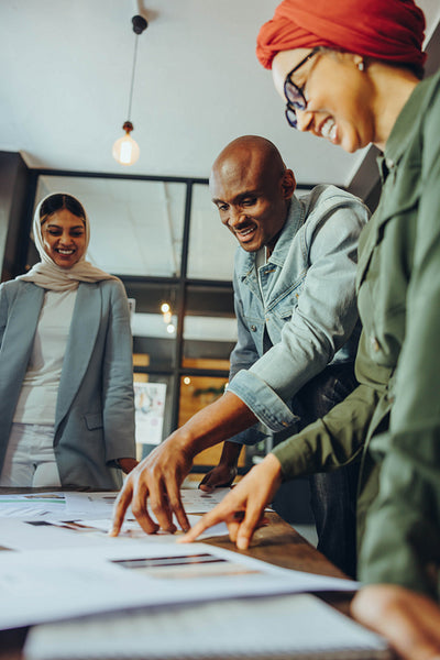 Happy designers working together in an office