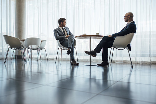 Business partners meeting in office cafe