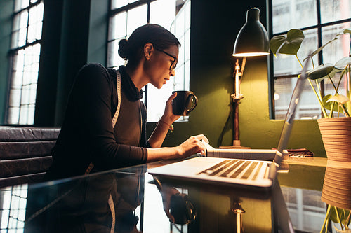 Fashion designer working in her desk