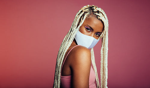 Portrait of african woman wearing face mask 