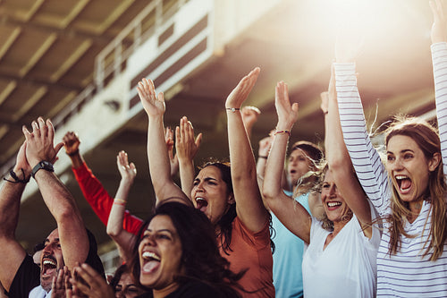 Soccer fans celebrate their team victory