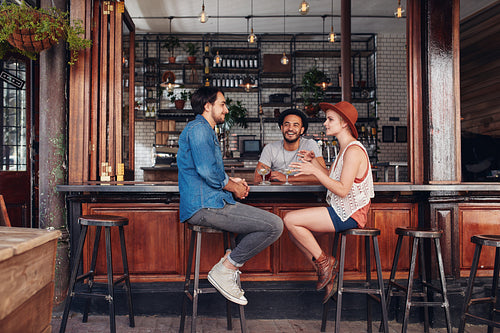 Group of young people meeting in a coffee shop