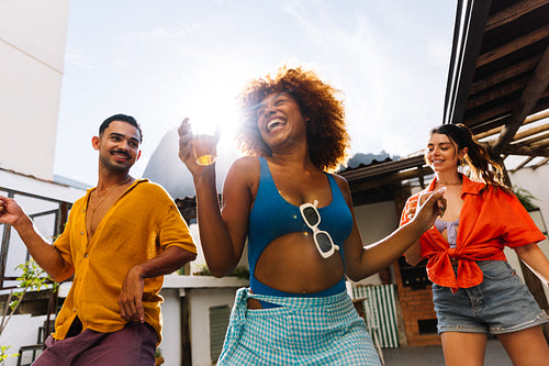 Three friends enjoying a sunny weekend outdoors in Rio de Janeiro