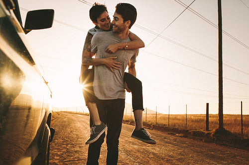 Couple enjoying outdoors on a mud track