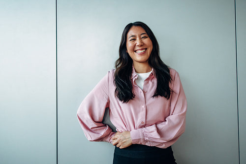 Cheerful female professional in casuals