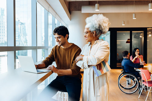 Business colleagues collaborate in a modern office