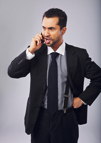 Businessman Mad at Someone Over the Phone