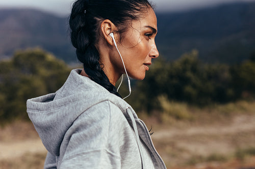 Female athlete taking a rest after workout