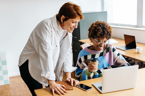 Diverse colleagues collaborating in a modern co-working space