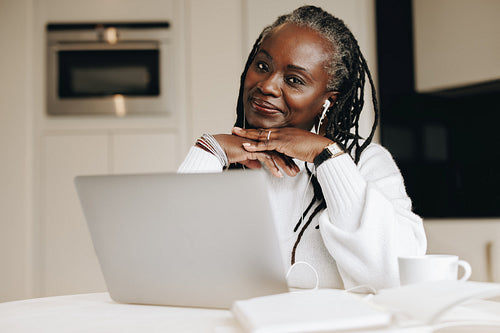 Ethnic businesswoman working from home