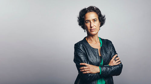 Portrait of a woman with arms crossed