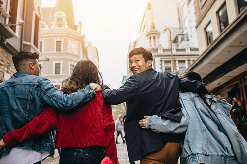 Young people outdoors on city street