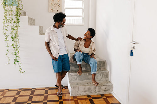 Husband and wife having a happy, relaxed moment with each other at home