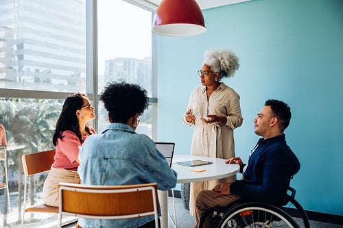 Sharing direction: Senior woman outlining the next steps