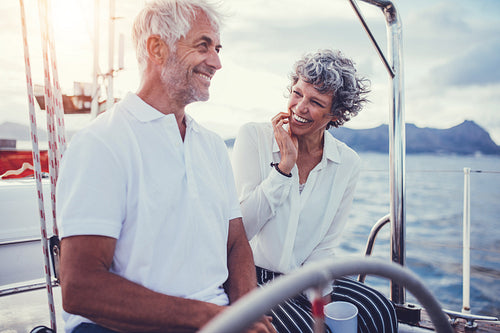 Happy relaxed couple on the boat