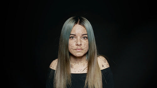  Woman standing on black background