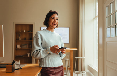 Businesswoman portrait in a bright, modern office