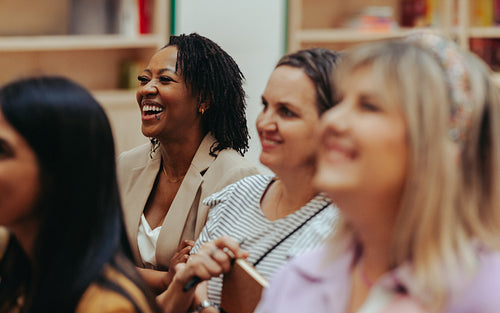 Multicultural business meeting with happy participants
