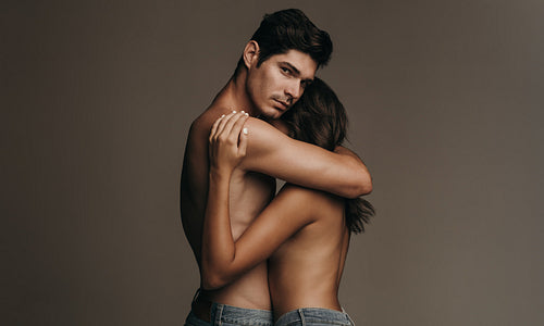 Intimate couple embracing each other