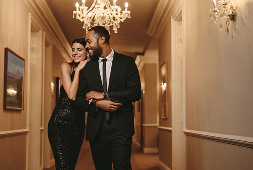 Beautiful couple in formalwear at a party