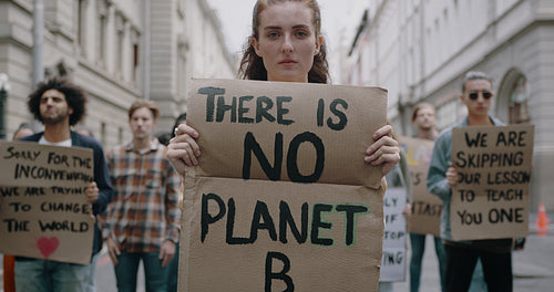Activists protesting on street against climate change