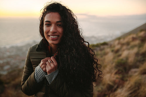 Woman in mountain peak on winter day