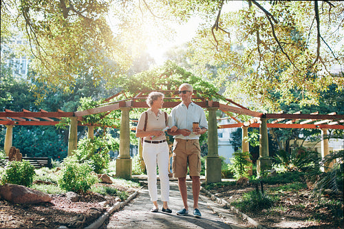 Senior tourist enjoying a walk in park