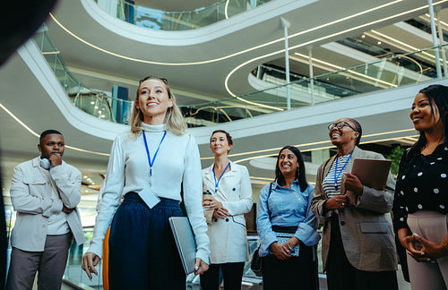 Diverse group of business professionals in a modern corporate setting