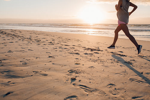 Female exercising on the beach