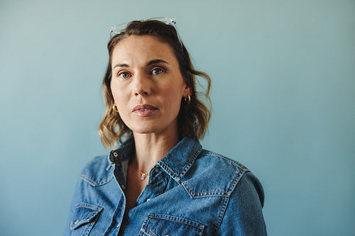 Confident middle-aged businesswoman in a studio portrait