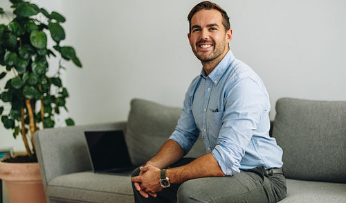 Successful businessman in office lobby