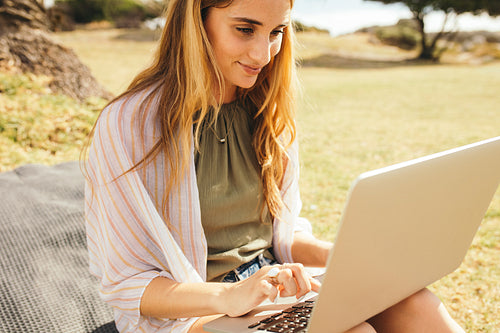 Woman working outdoors
