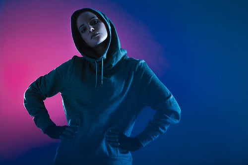 Confident woman in sweatshirt