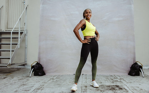 Portrait of a fit african woman in sportswear