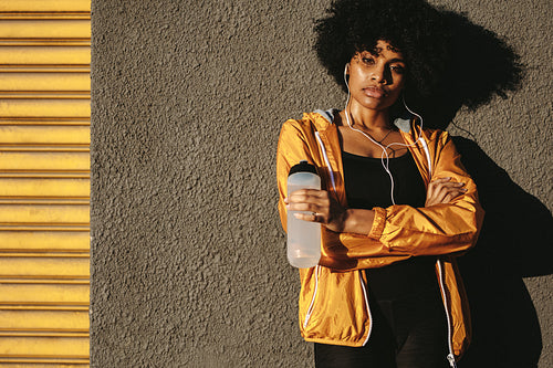 Athletic woman taking a break