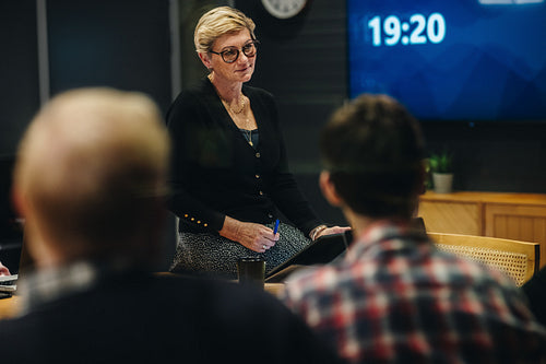 Female business leader conducting a meeting
