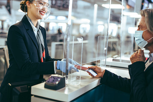 Businessman at airline check-in counter