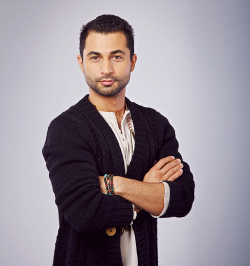 Confident Young Man with Arms Crossed